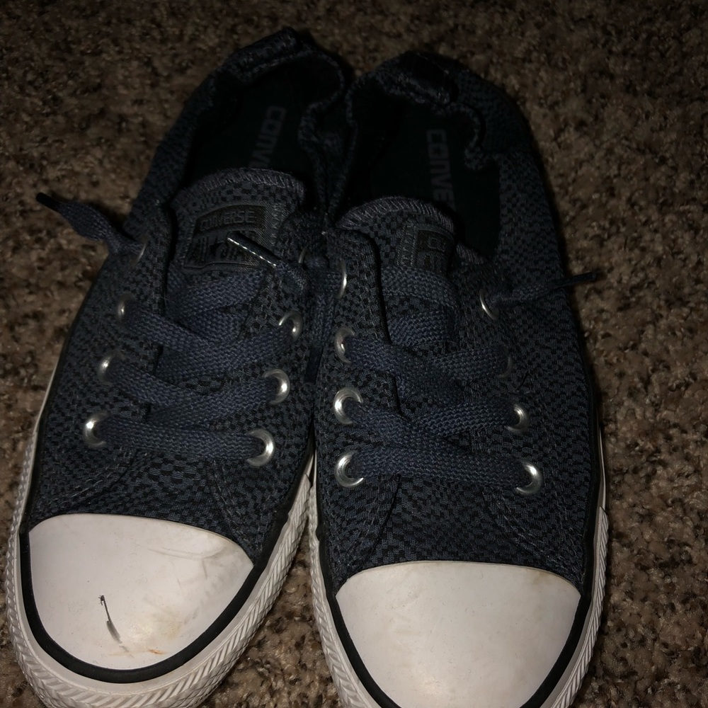 Slip on navy blue converse with checkered design